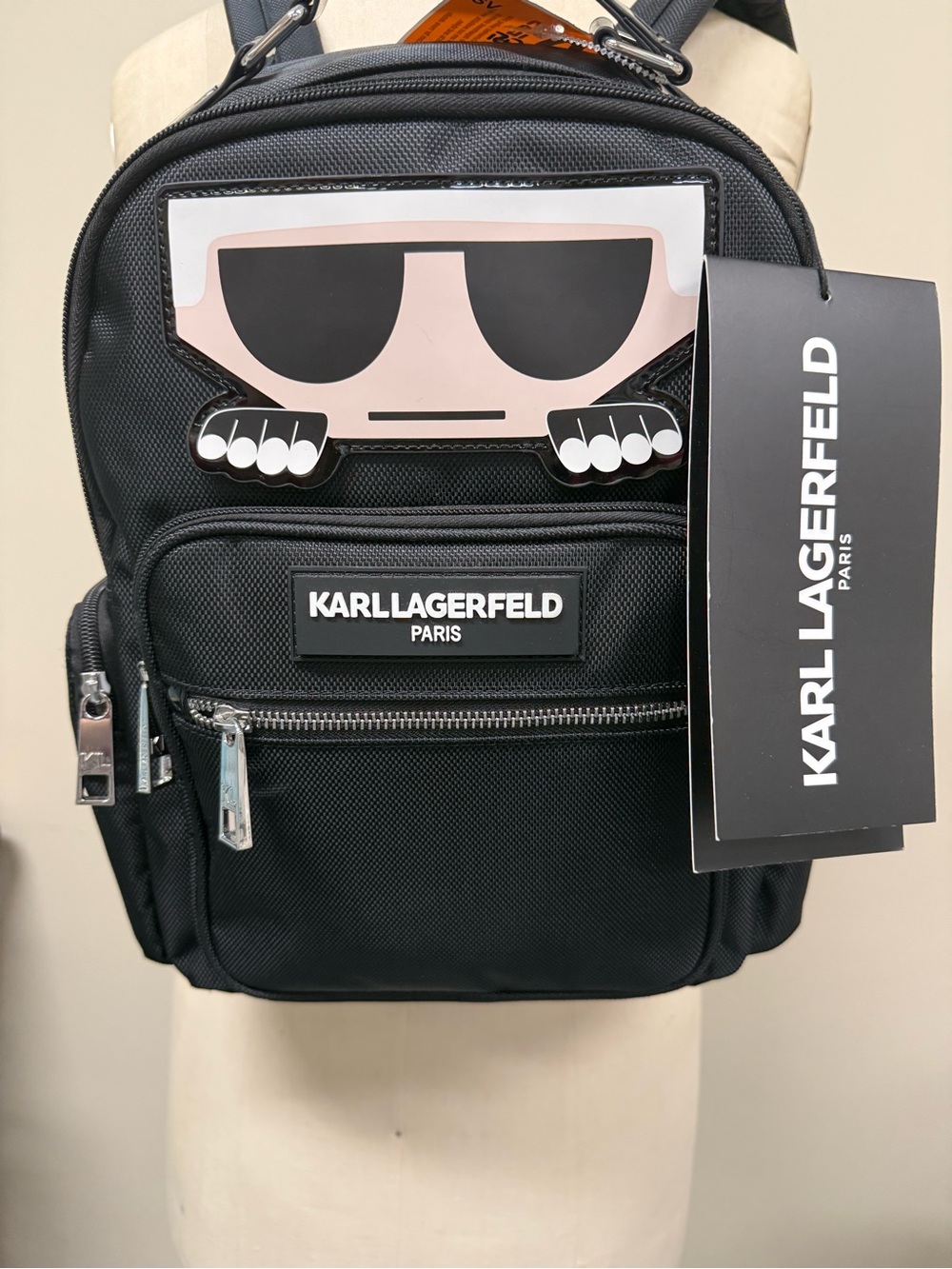 Karl Lagerfeld Travel Black Mini Backpack with Graphic “peekaboo” Lets go,  NWT